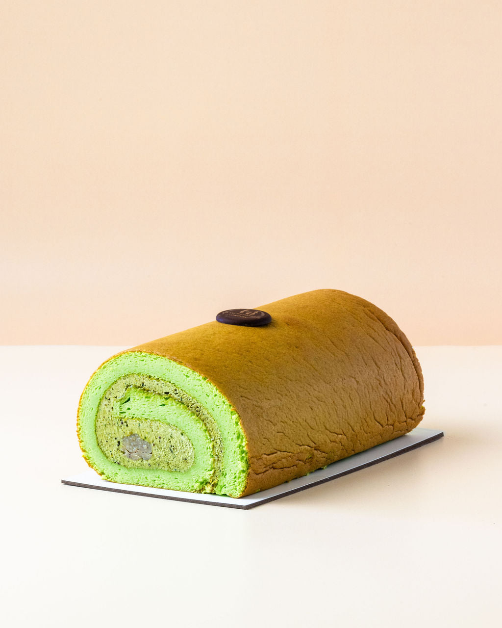 Pistachio & Raspberry Roll Cake